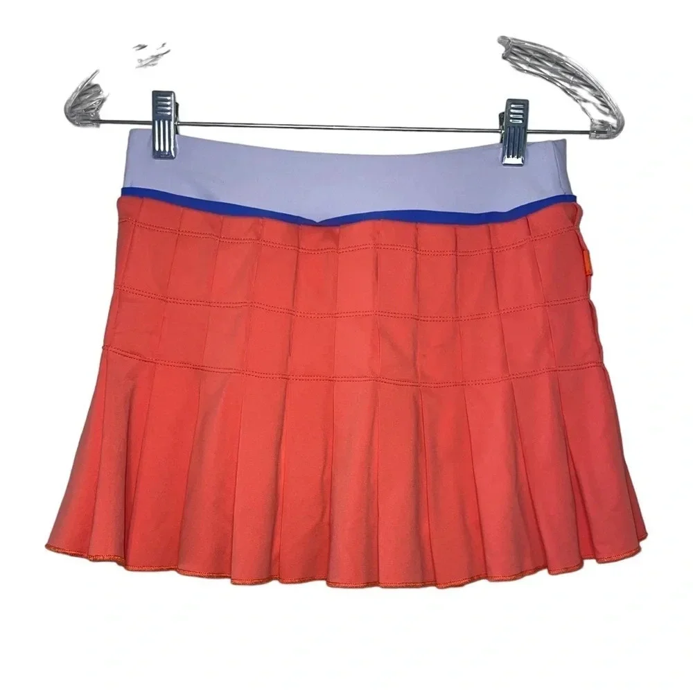 NIKE Fit Dry Pleated Tennis Skort Size XS Salmon Coral Pink Golf Athletic Spring